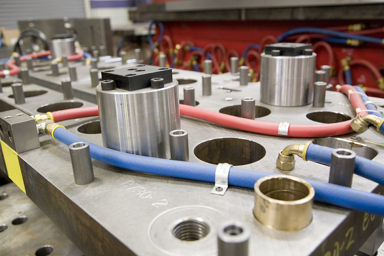 Precision mold components during tool assembly at Hi-Tech Mold